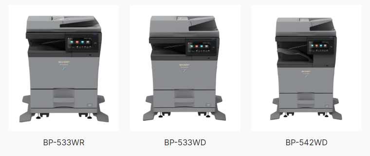 Trzy drukarki serii Sharp Terra: BP-533WR, BP-533WD, BP-542WD. Wszystkie drukarki są w odcieniach szarości, mają nowoczesny wygląd z ekranami dotykowymi i podajnikami papieru na górze.